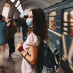 coronavirus-pandemic-back-view-young-girl-with-backpack-wearing-protective-medical-face-mask