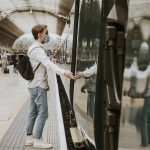 man-waiting-train-platform