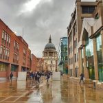 people-walking-building-rainy-season