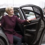 taxi-driver-female-client-interacting-formal-way (1)